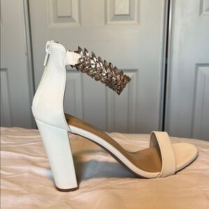 Elegant White Heeled Sandals with Silver Accents